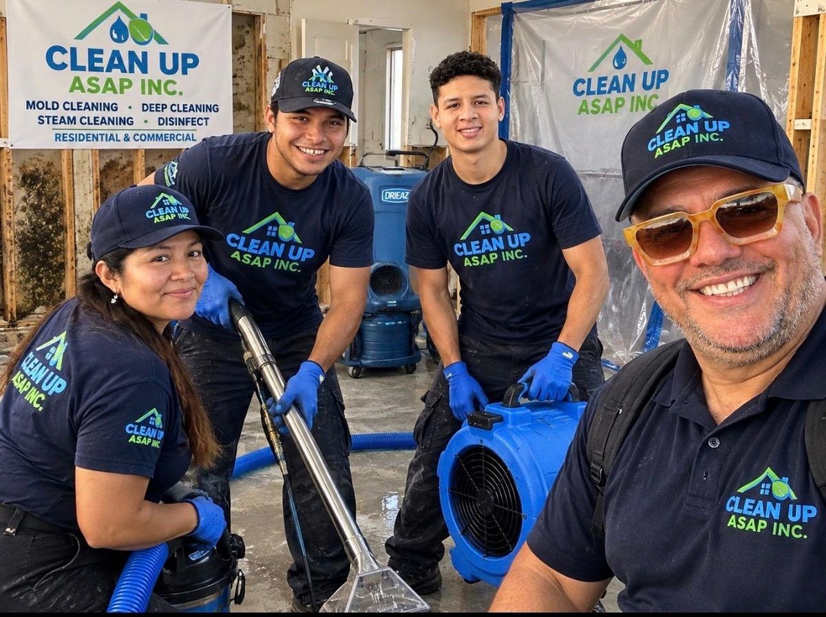 The Clean Up ASAP crew on a job site with professional cleanup equipment